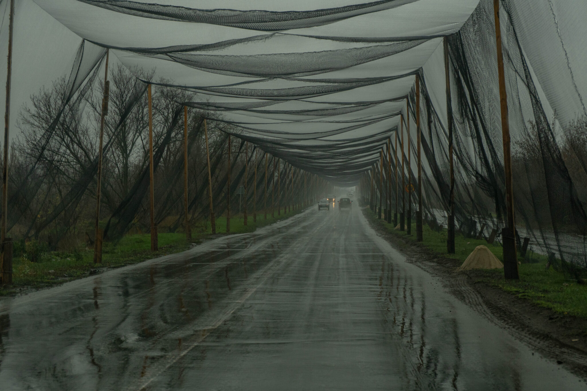 Roads all around Kramatorsk are being equipped with nets to protect them from FPV drone attacks on vehicles, both civilian and military